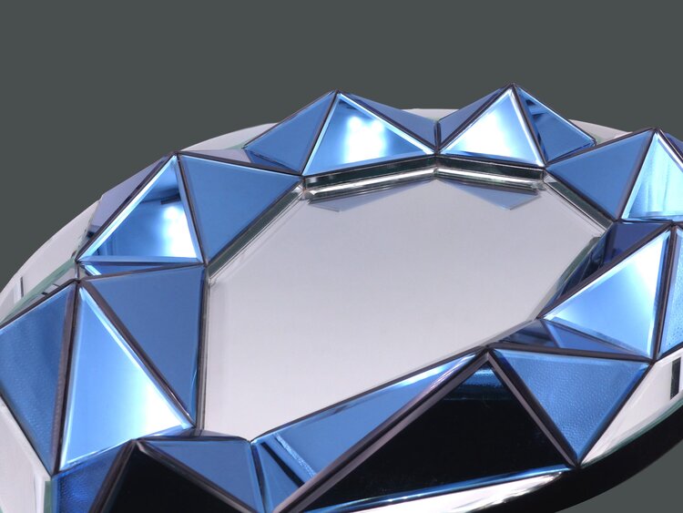 MIROIR FACETTÉ PAR OLIVIER DE SCHRIJVER