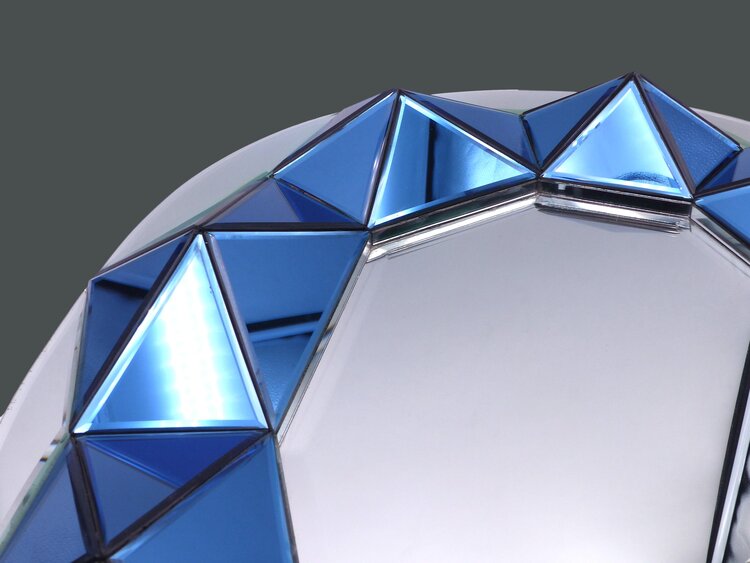 MIROIR FACETTÉ PAR OLIVIER DE SCHRIJVER