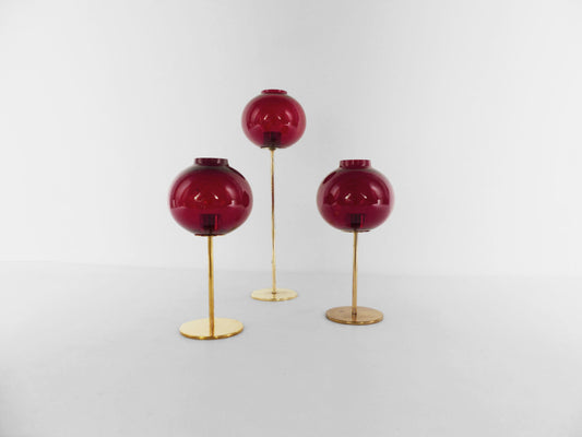 Set of three Hans-Agne Jakobsson AB Markaryd NR135 red tealight candle holders