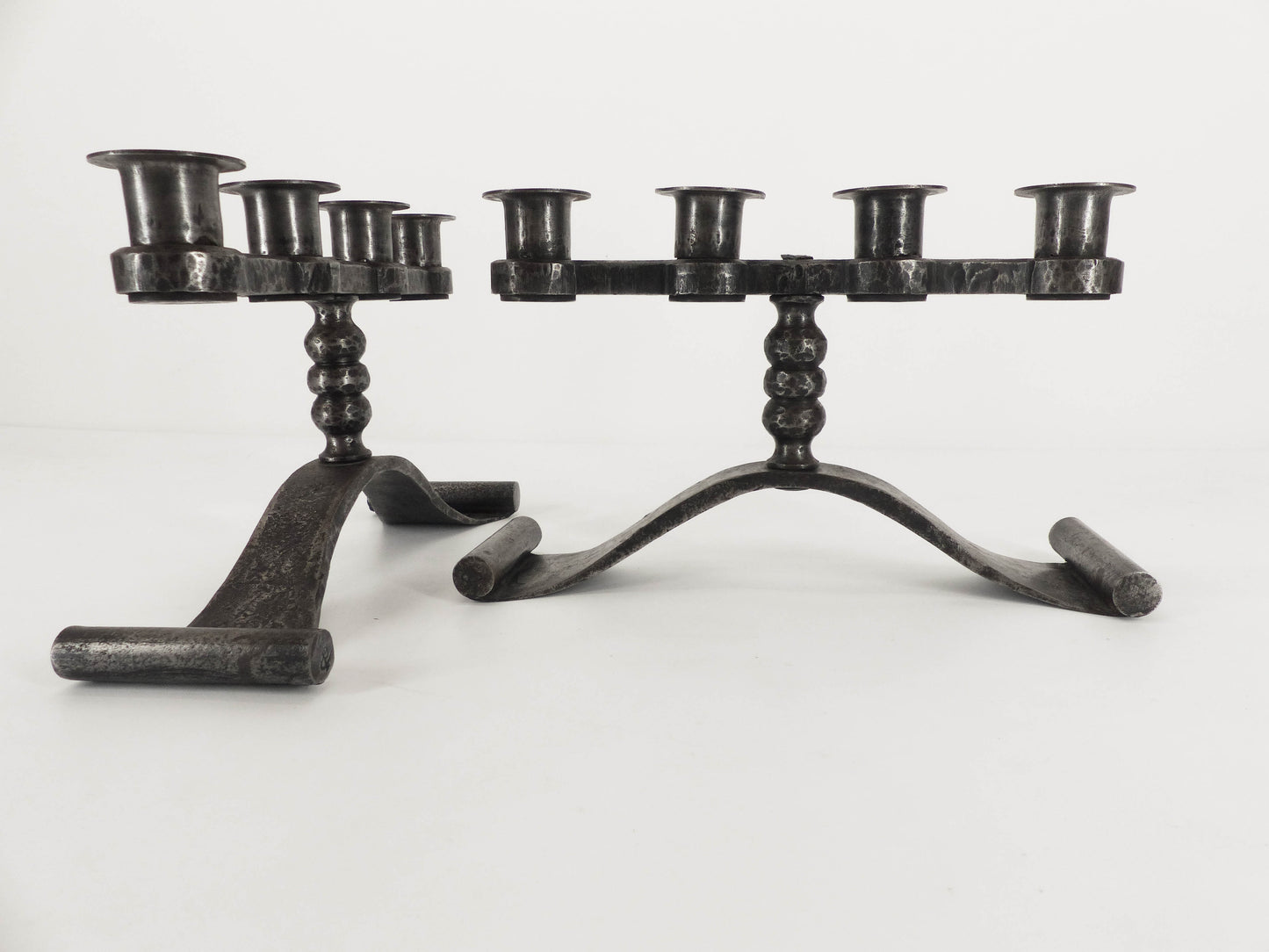 Pair of Charles Piguet brutalist wrought iron candlesticks