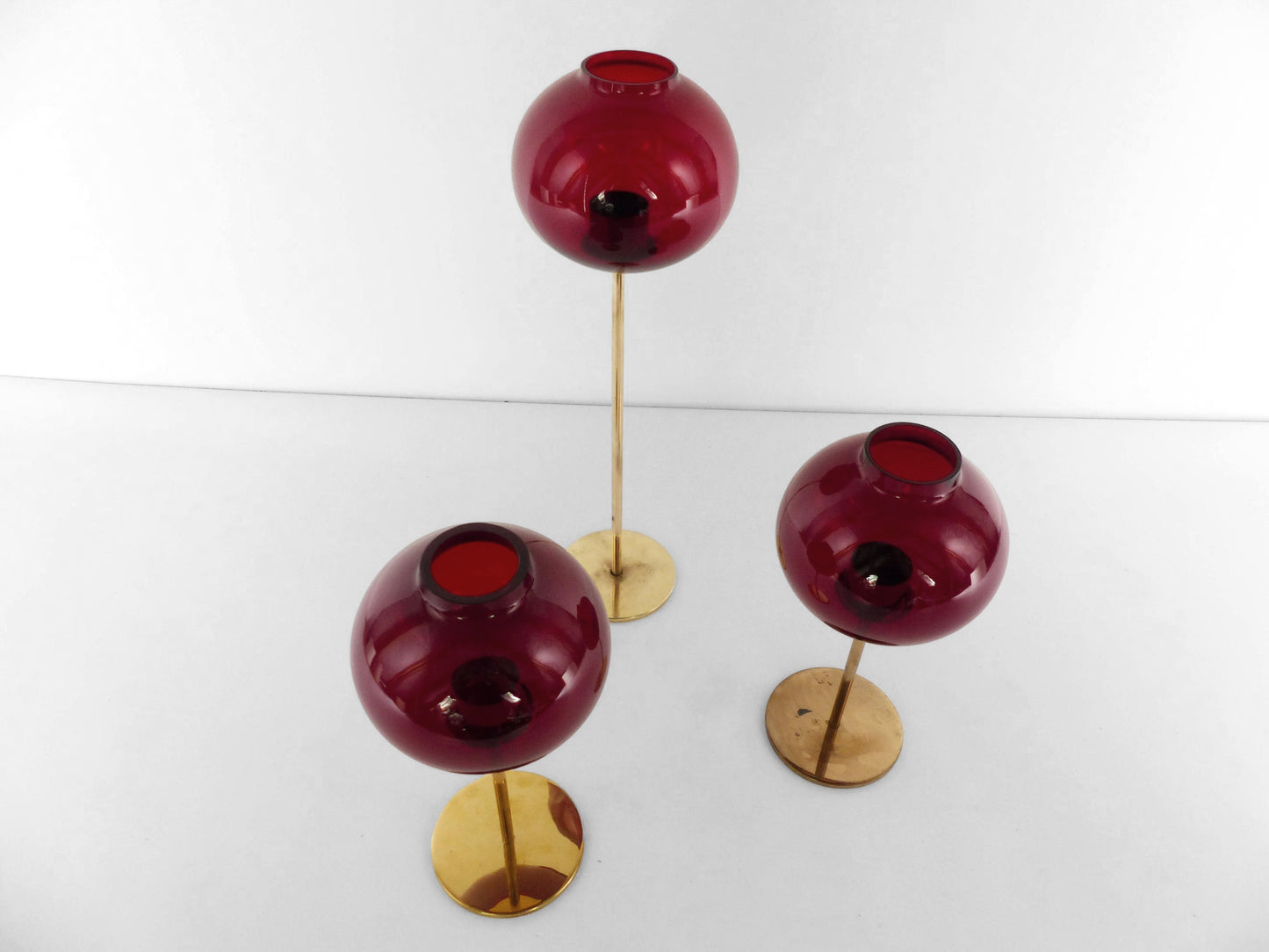 Set of three Hans-Agne Jakobsson AB Markaryd NR135 red tealight candle holders