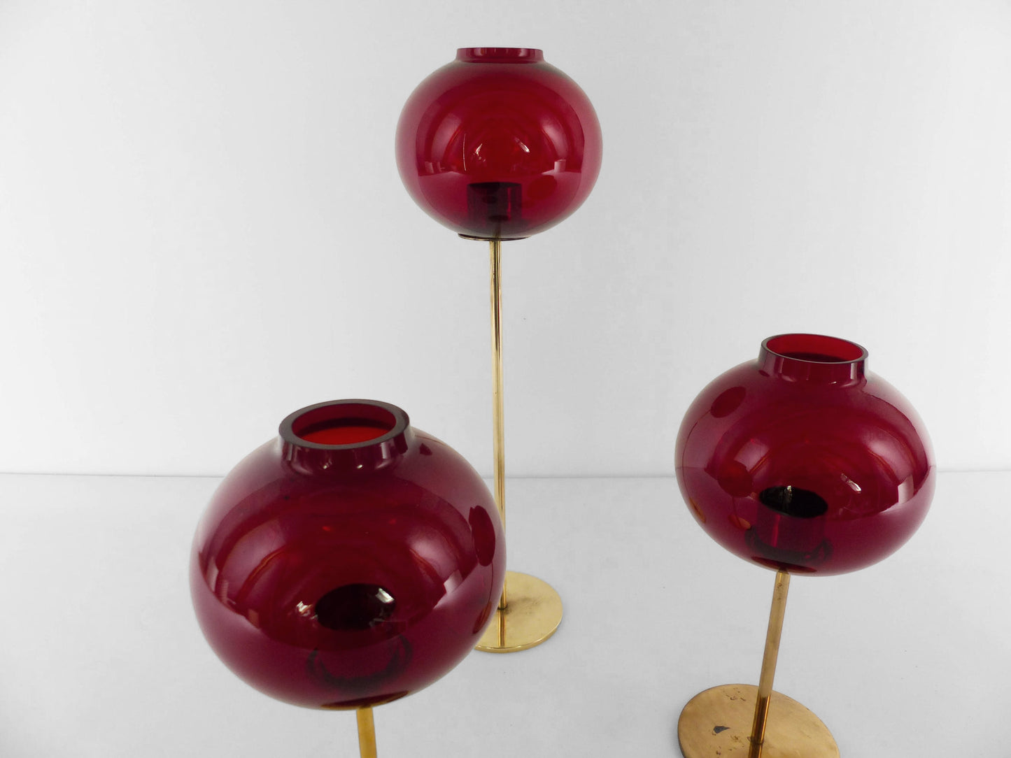 Set of three Hans-Agne Jakobsson AB Markaryd NR135 red tealight candle holders