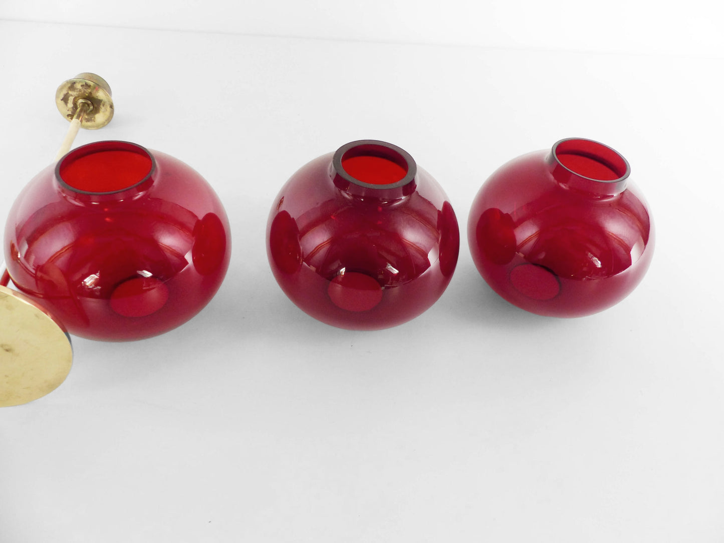 Set of three Hans-Agne Jakobsson AB Markaryd NR135 red tealight candle holders