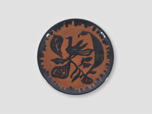 ASSIETTE JEAN LURÇAT ORANGE ET NOIRE AU SUJET D'UN OISEAU STYLISÉ 1950