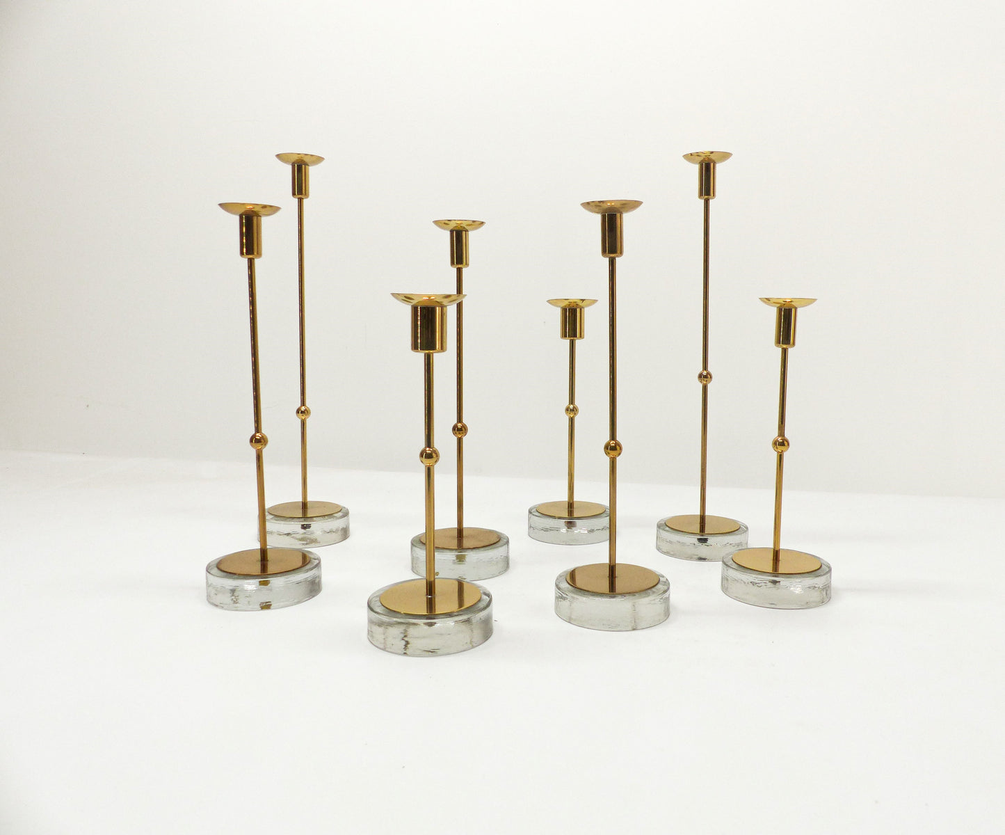 Set of 8 Scandinavian candlesticks Gunnar Ander for Ystad Metall 1960