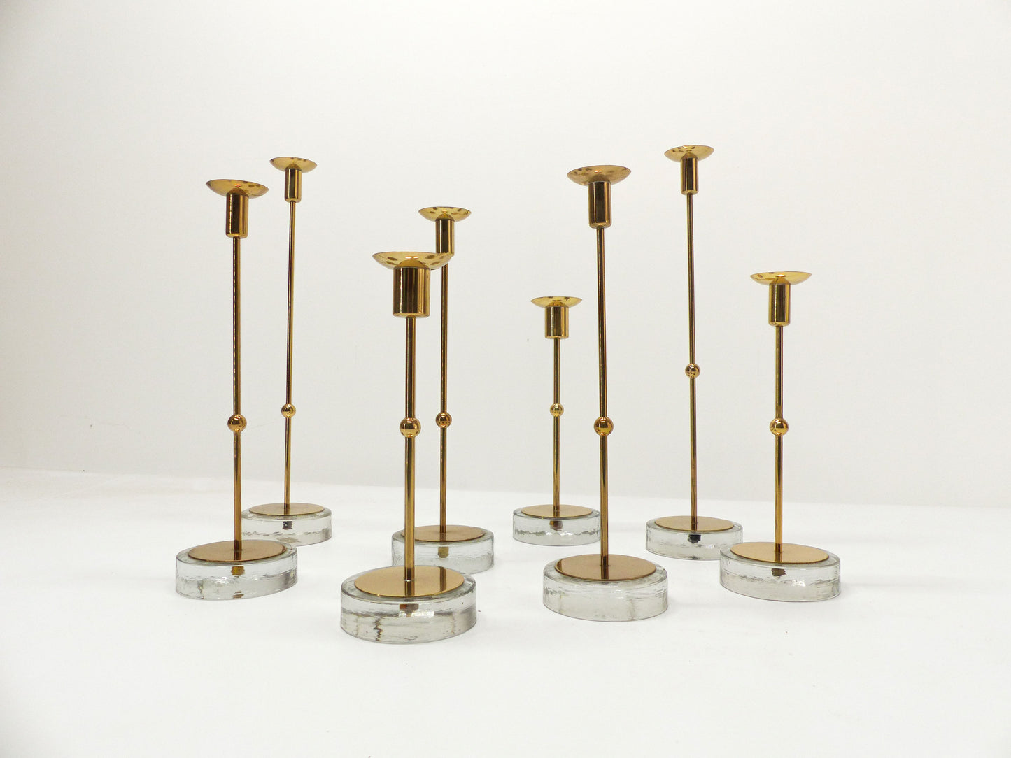 Set of 8 Scandinavian candlesticks Gunnar Ander for Ystad Metall 1960