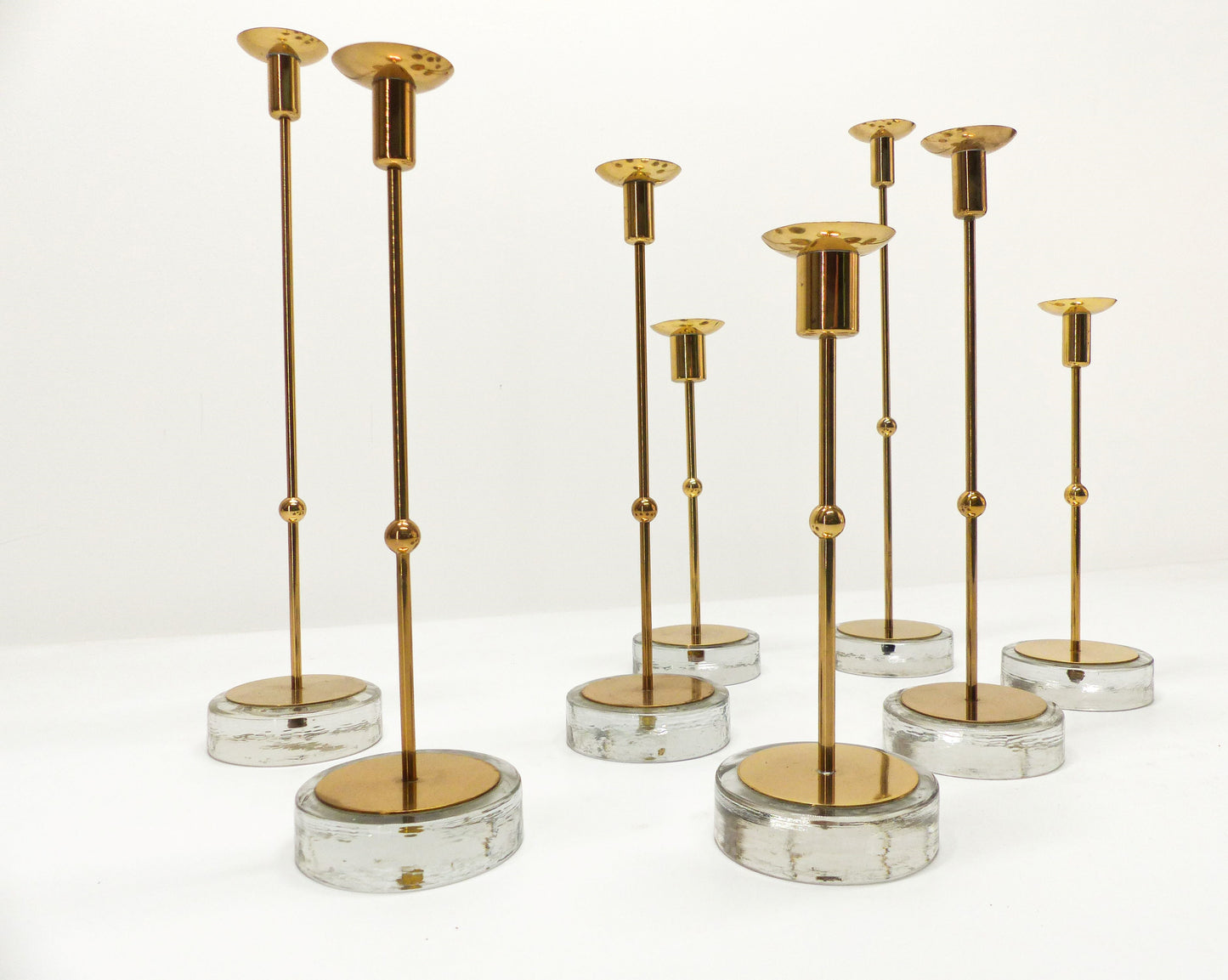 Set of 8 Scandinavian candlesticks Gunnar Ander for Ystad Metall 1960