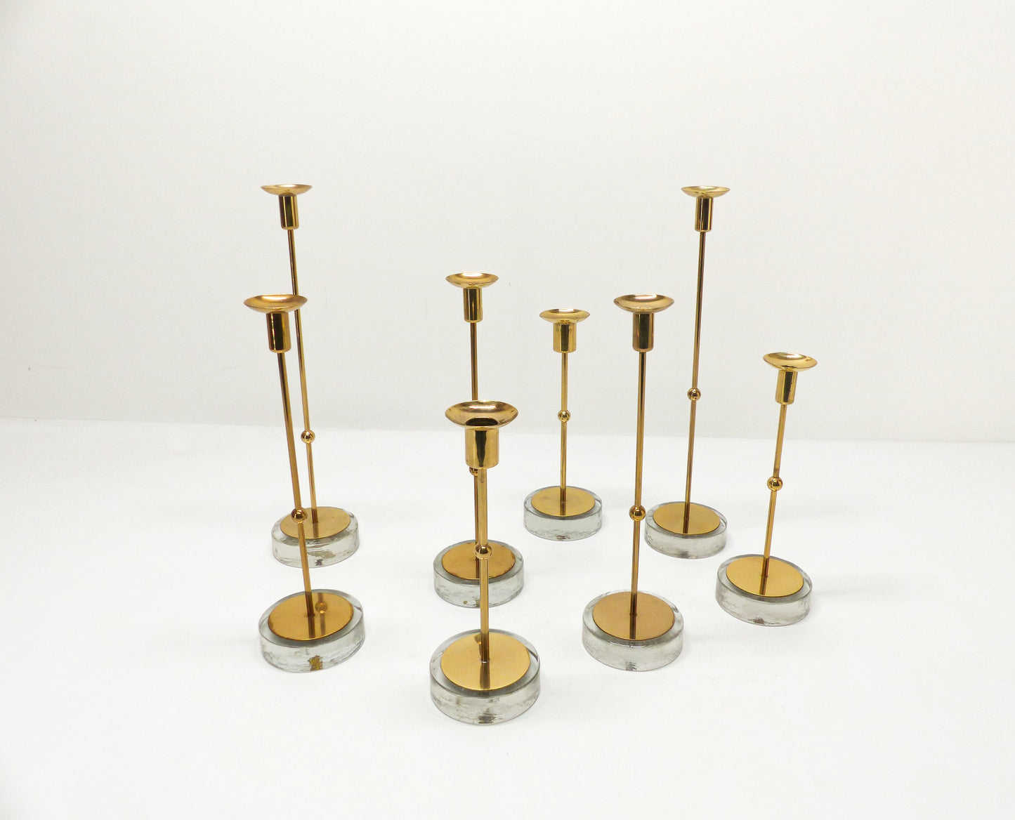 Set of 8 Scandinavian candlesticks Gunnar Ander for Ystad Metall 1960