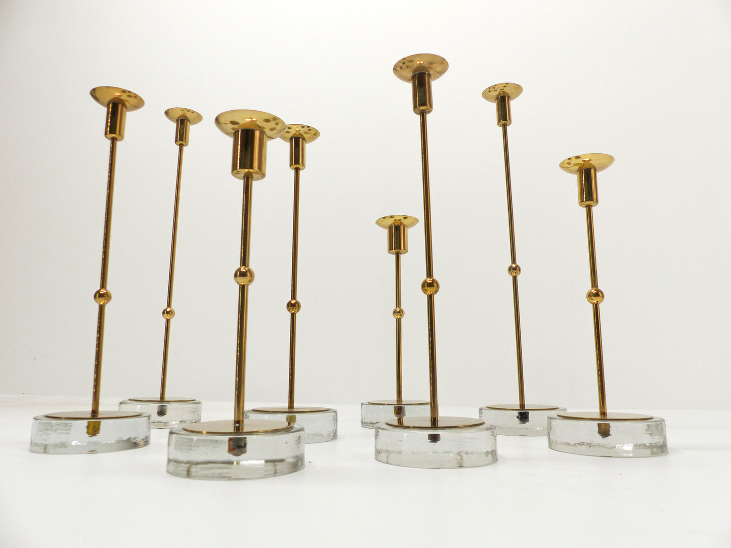 Set of 8 Scandinavian candlesticks Gunnar Ander for Ystad Metall 1960