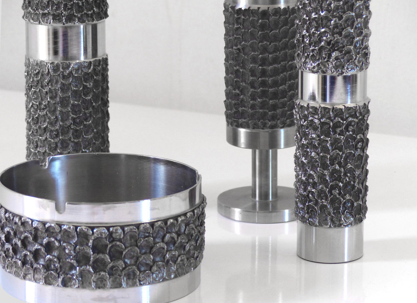 BRUTALIST SET OF METAL VASES AND ASHTRAYS