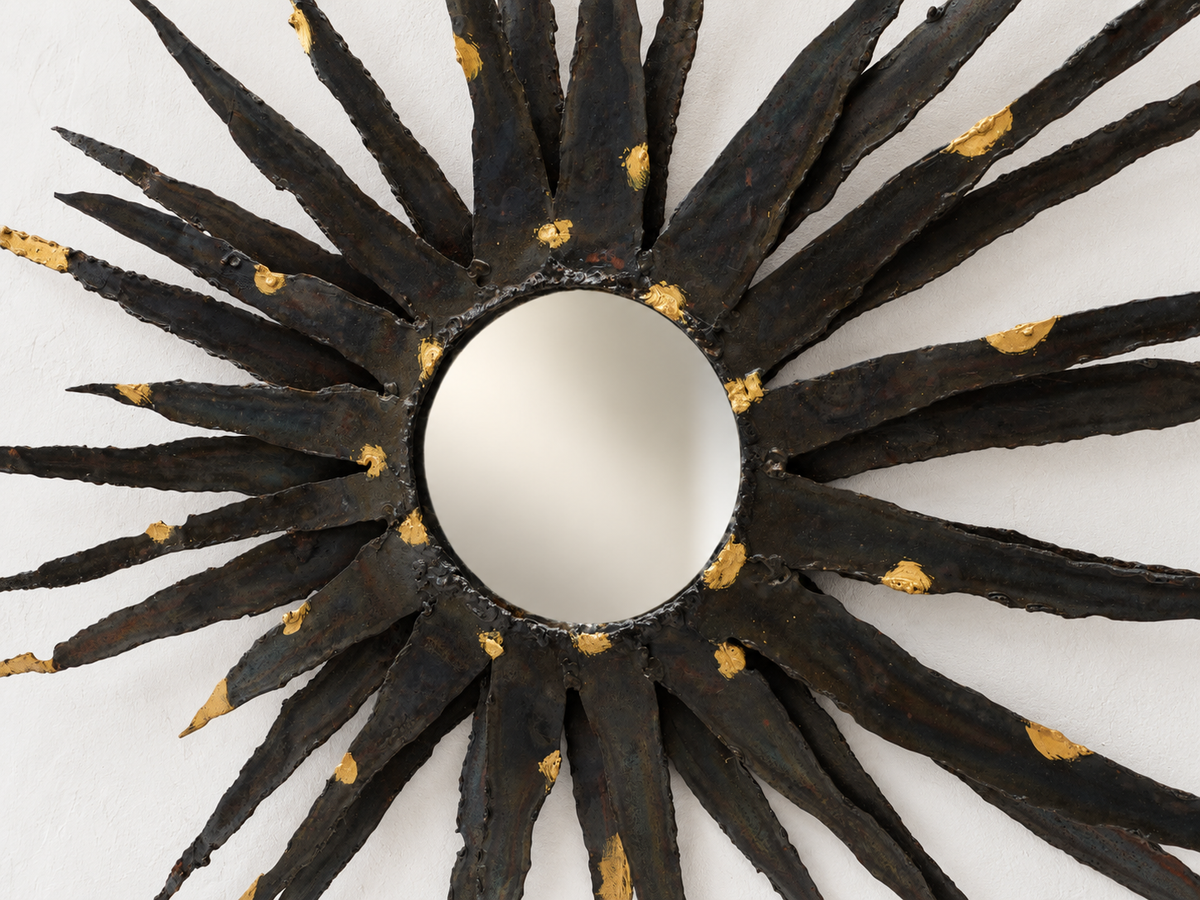 Large brutalist sunburst mirror in patinated metal with gold-toned accents – europe, circa 1970