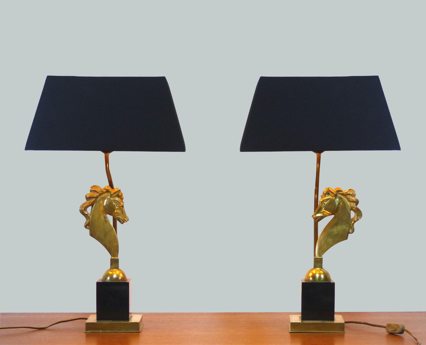 Pair of Hollywood Regency lamps with horses