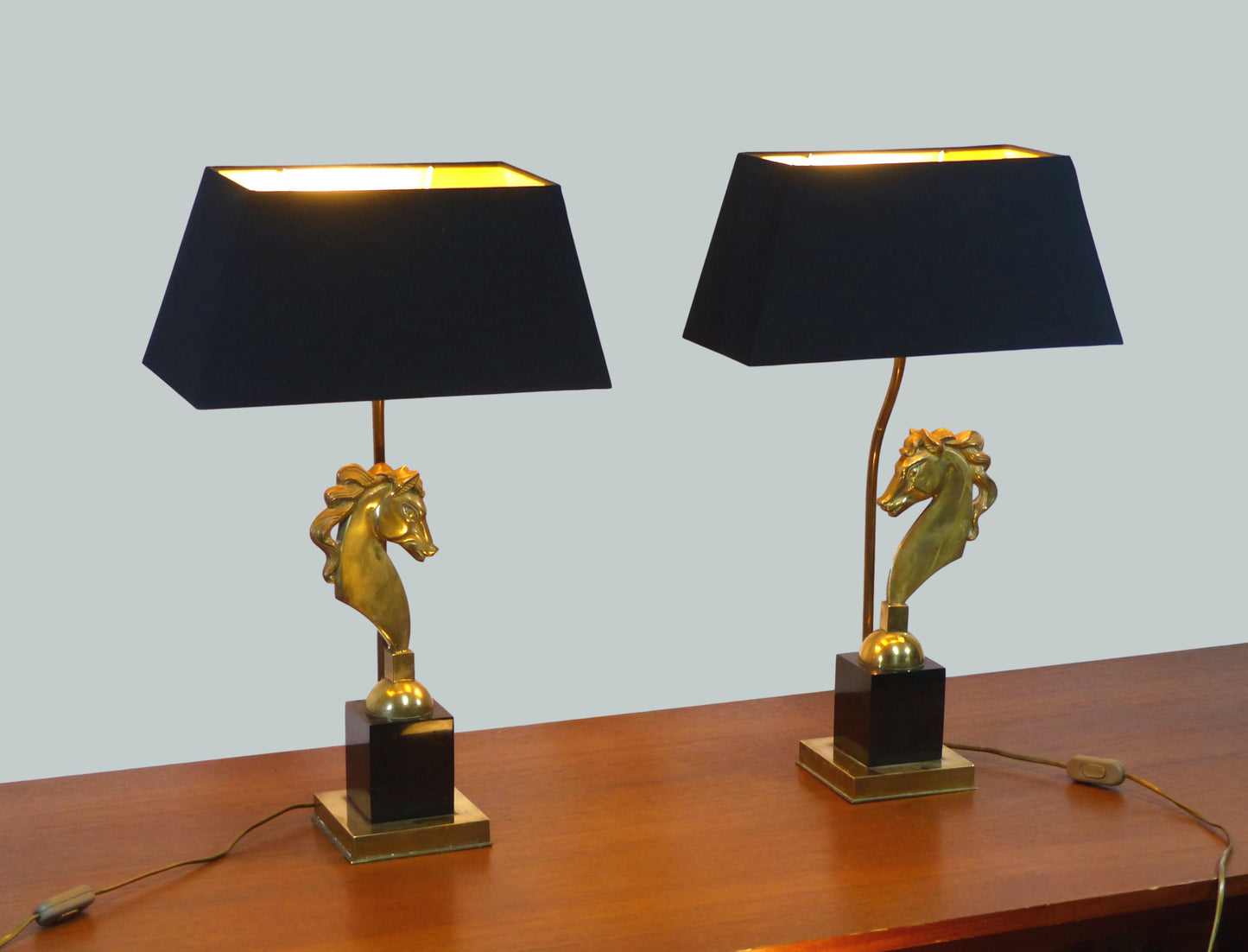 Pair of Hollywood Regency lamps with horses