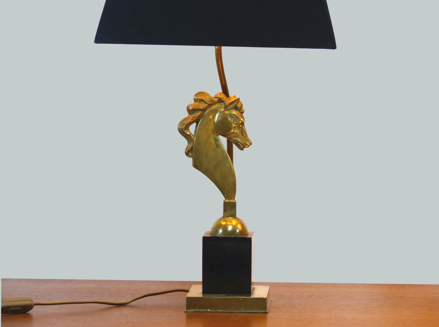 Pair of Hollywood Regency lamps with horses