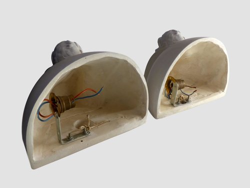 PAIR OF PLASTER SYMBOLIST WALL LIGHTS