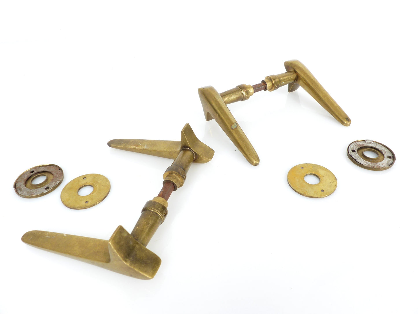 2 pairs of modernist solid brass door handles 1950–1960