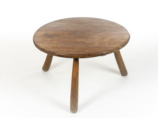 Table basse brutaliste en bois massif tripode